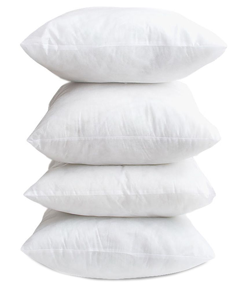 white fluffy cushions