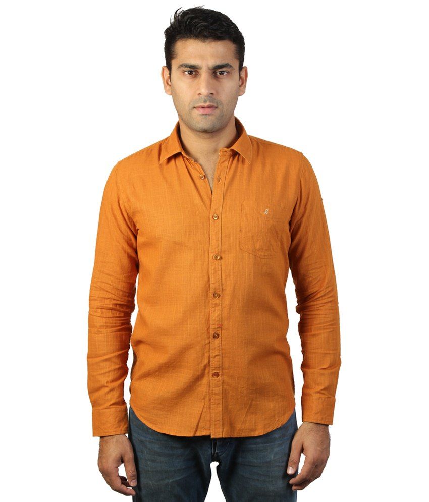 jeans with orange shirt