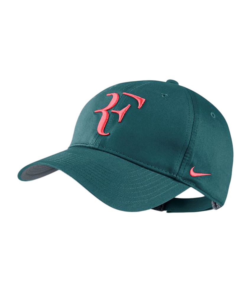 يضع إنكوميوم بصق federer cap nike 