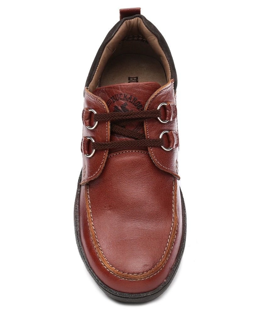 tanned boat shoes