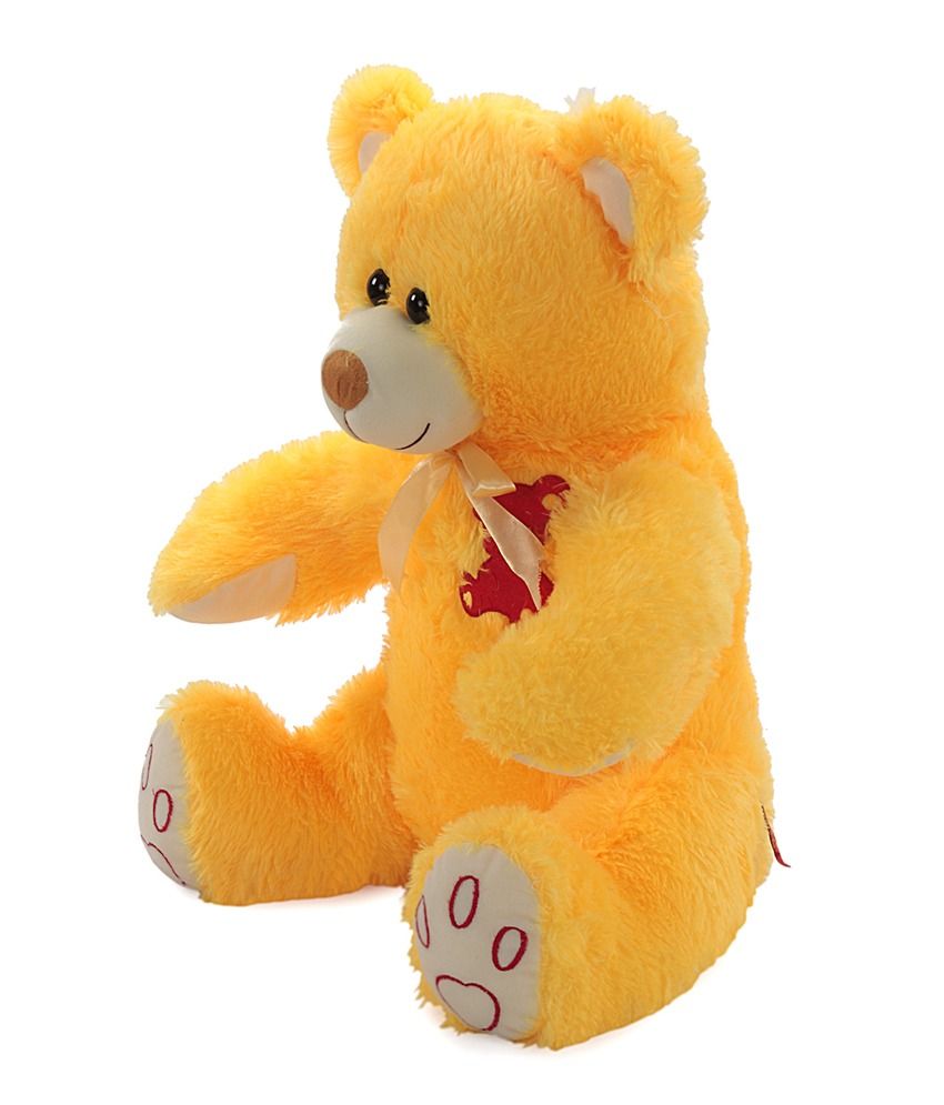 white and yellow teddy bear