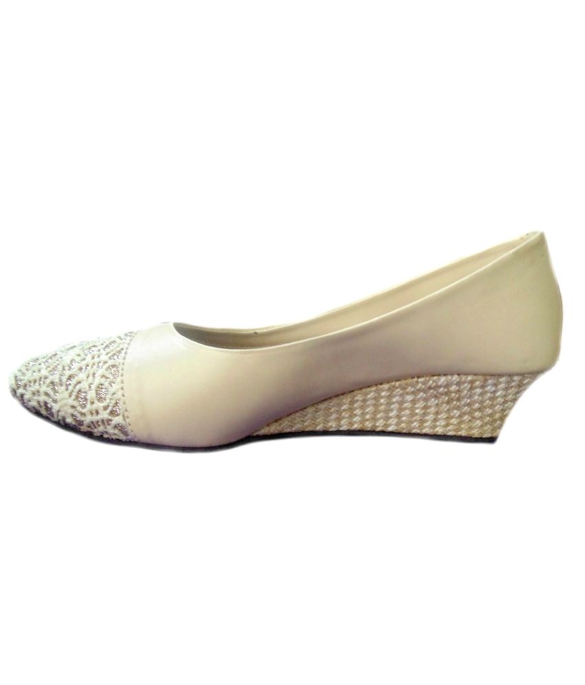 plain ivory pumps
