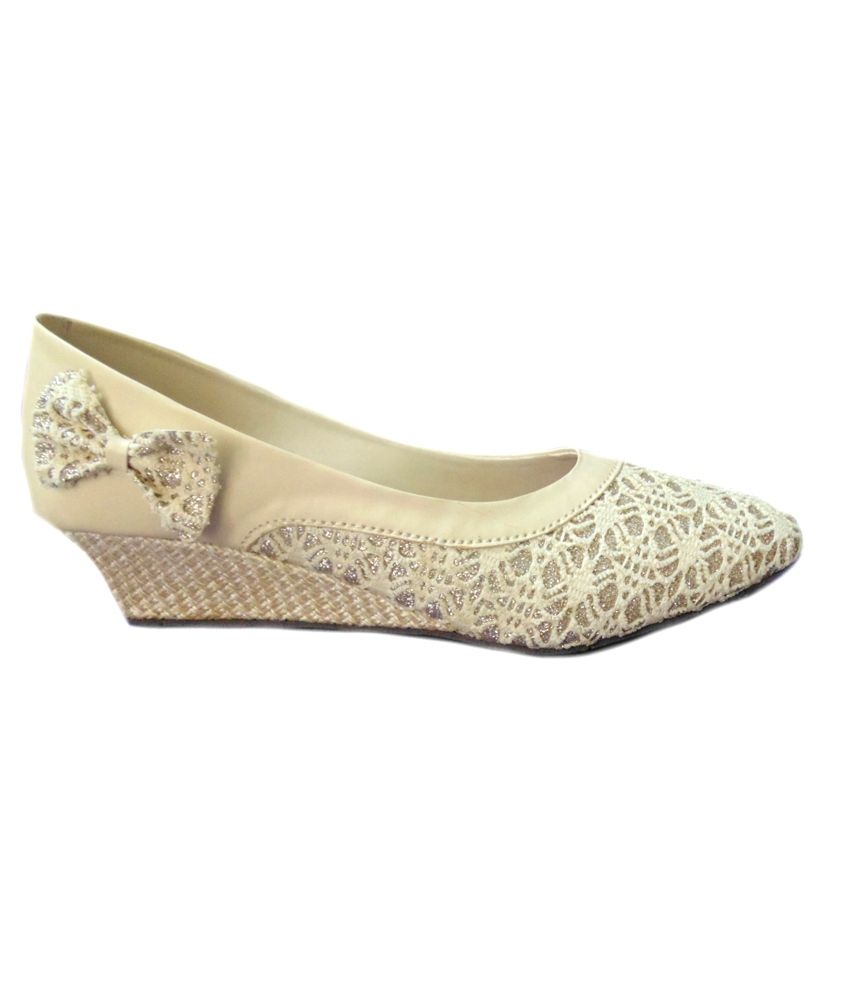 ivory wedge pumps