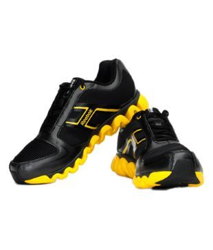 reebok black and yellow