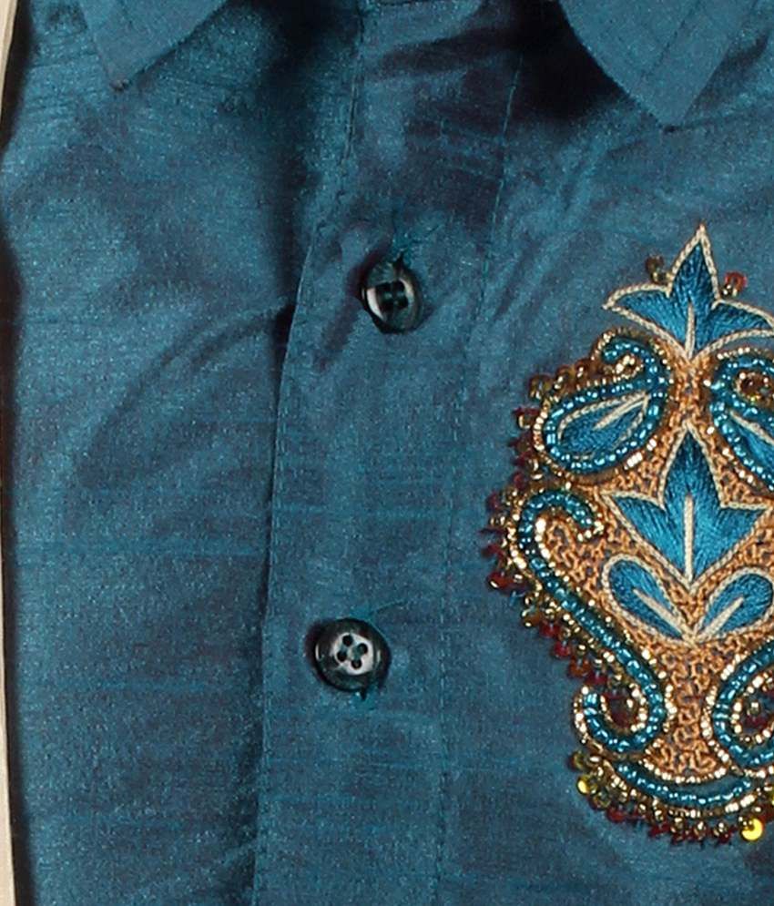 blue shirt and dhoti