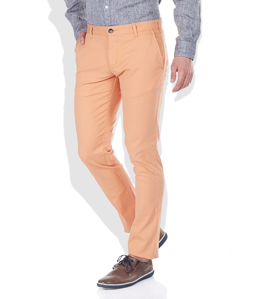 dark orange trousers