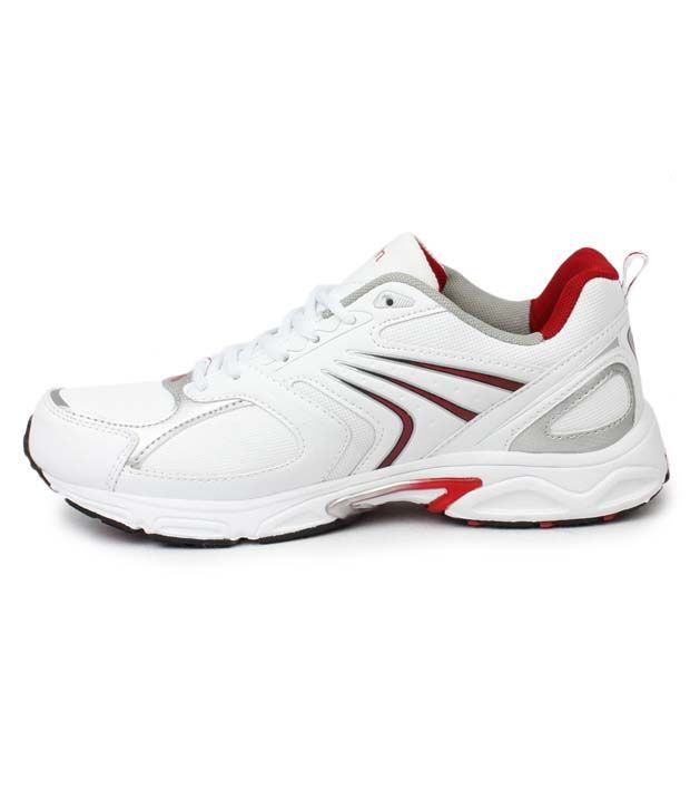 action white sports shoes