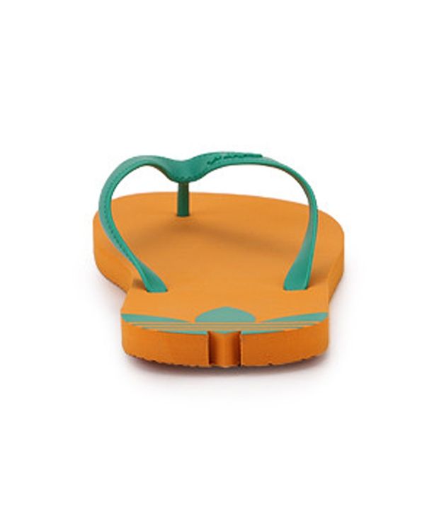 orange adidas flip flops