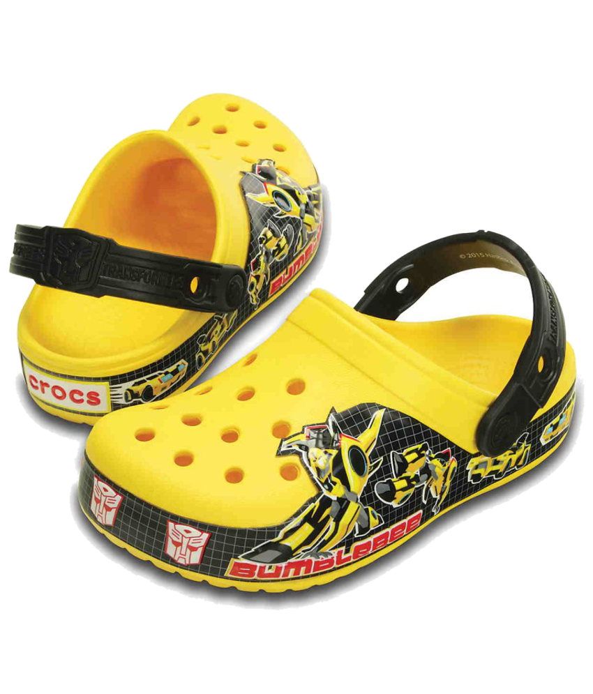 yellow crocs with flowers