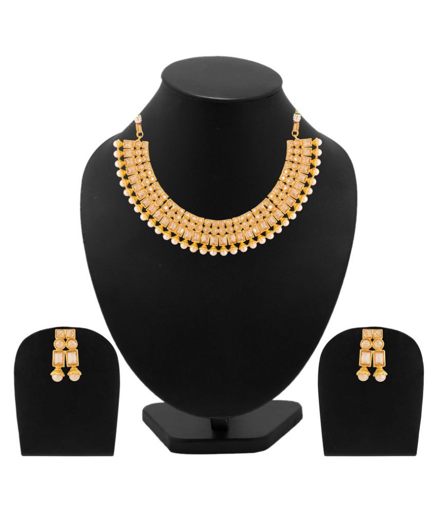 Voylla Traditional Gold Plated Necklace Set Studded With Beige Stones Buy Voylla Traditional Gold Plated Necklace Set Studded With Beige Stones Online At Best Prices In India On Snapdeal Please treat your jewelry with care, avoid contact. snapdeal