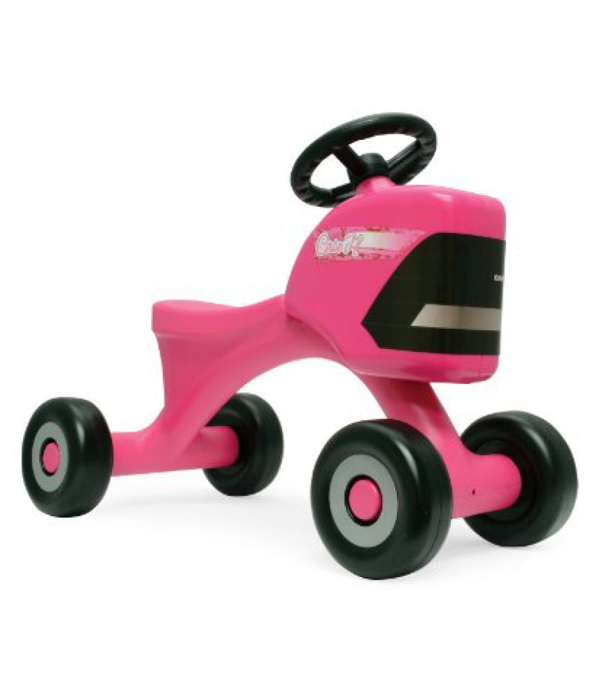 pink tractor ride on toy