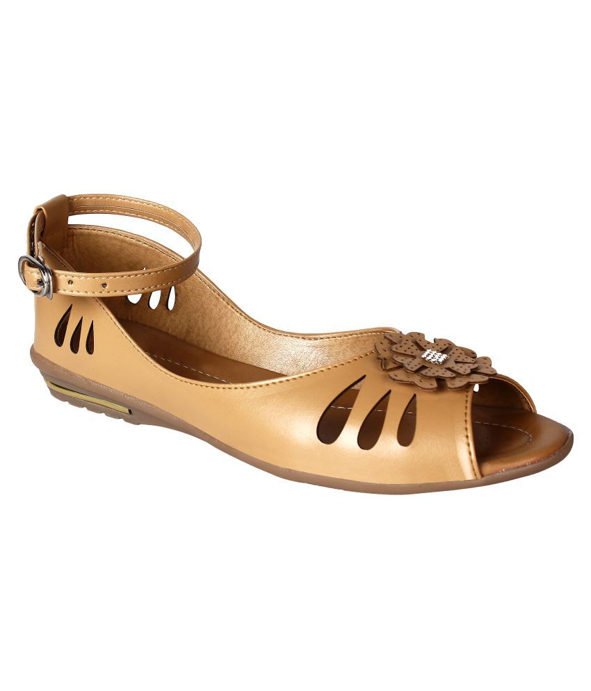 beige flats with black tips