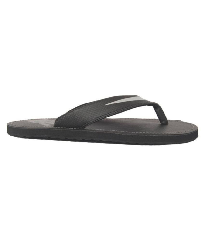 nike black and white flip flops