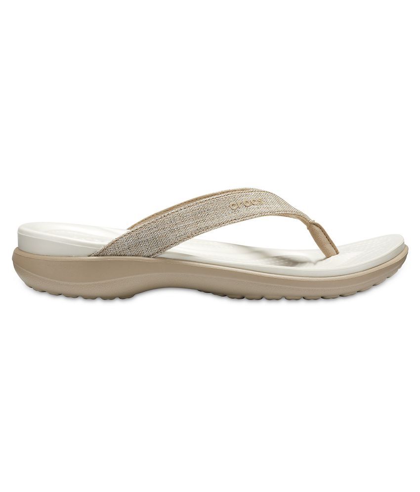 tan crocs flip flops