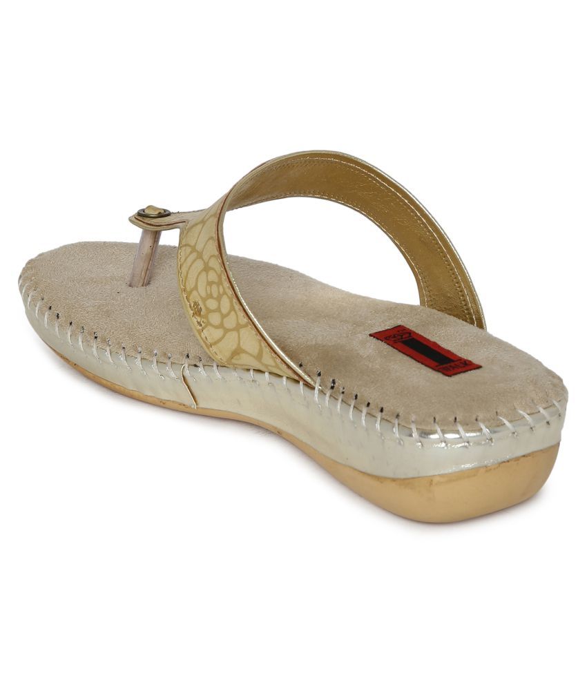 beige flats with black tips