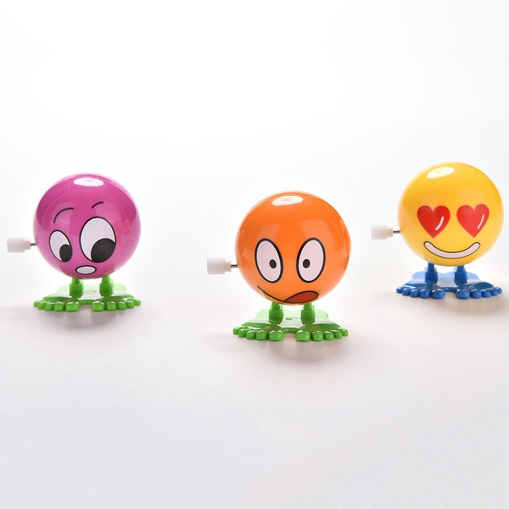 1pc-wind-up-face-expressions-ball-funny-cartoon-somersault-running