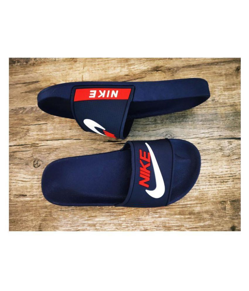 royal blue nike flip flops