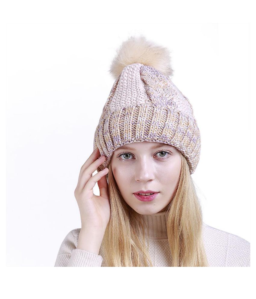 ball on top of winter hat