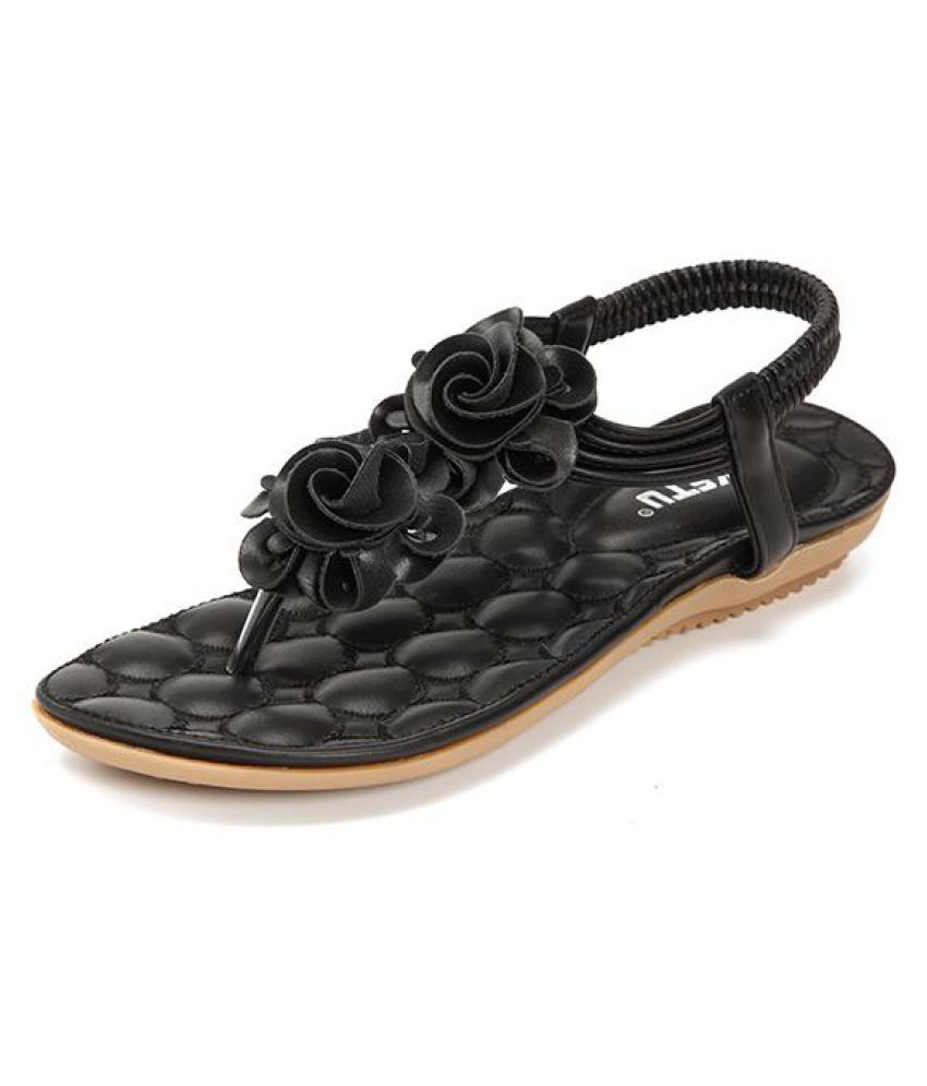 flat sandals with flowers on top