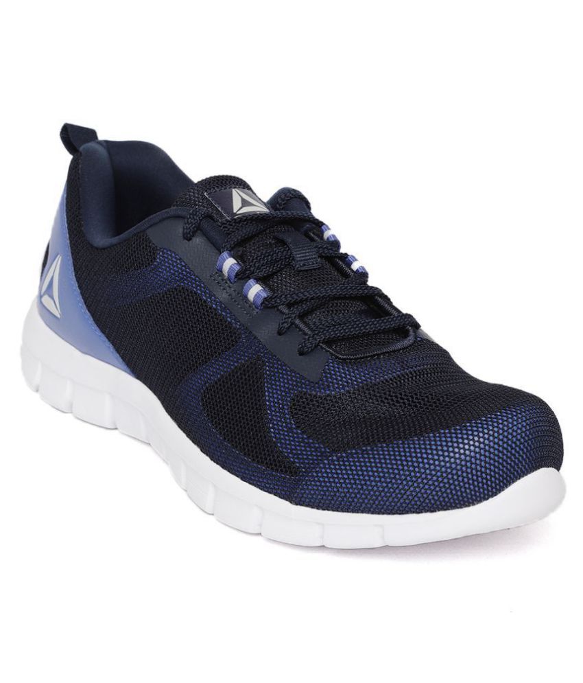 navy reebok trainers