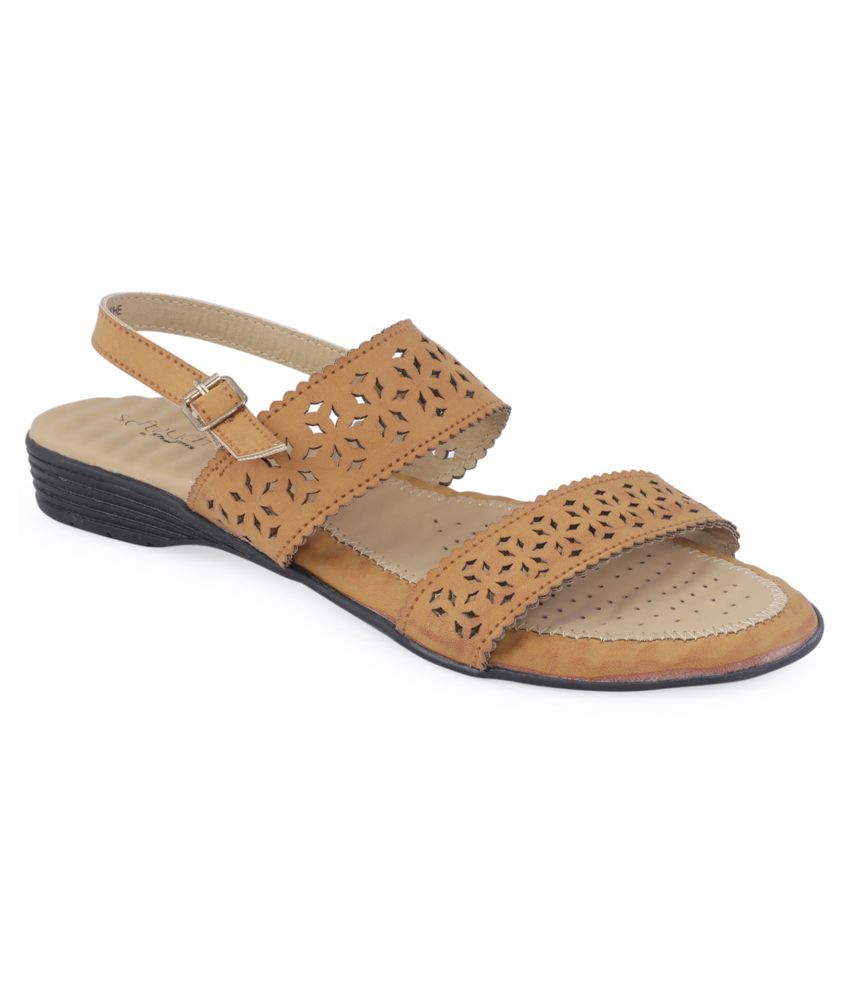 pointy tan flats