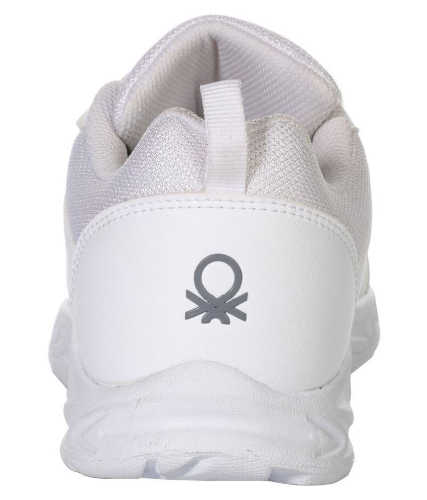 ucb white sneakers myntra