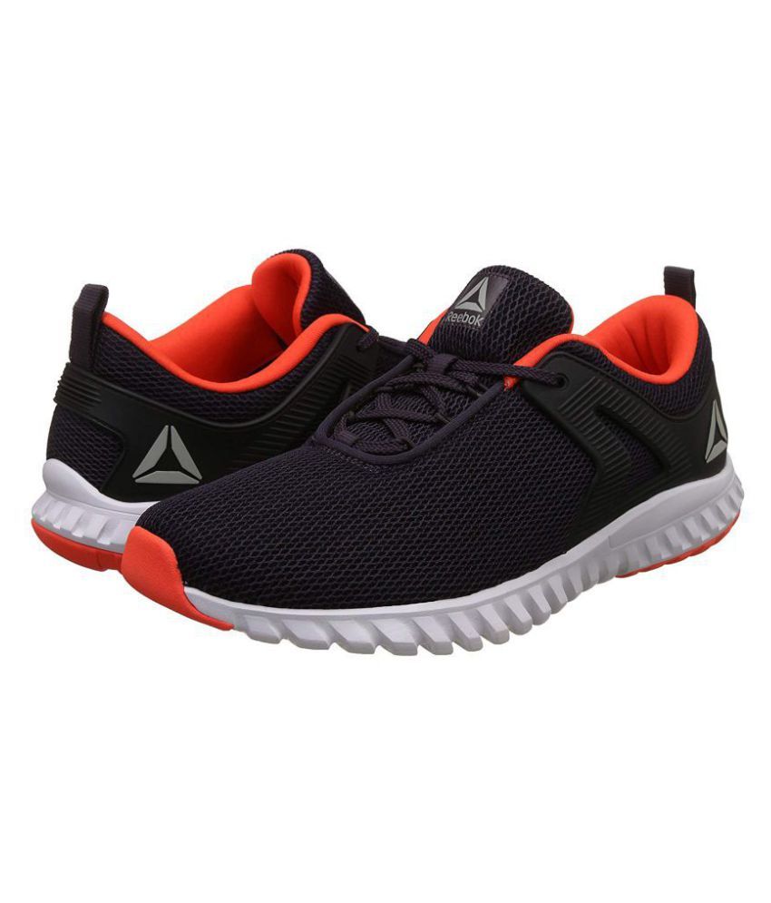 navy reebok trainers