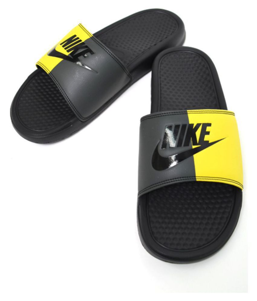 yellow nike flip flops