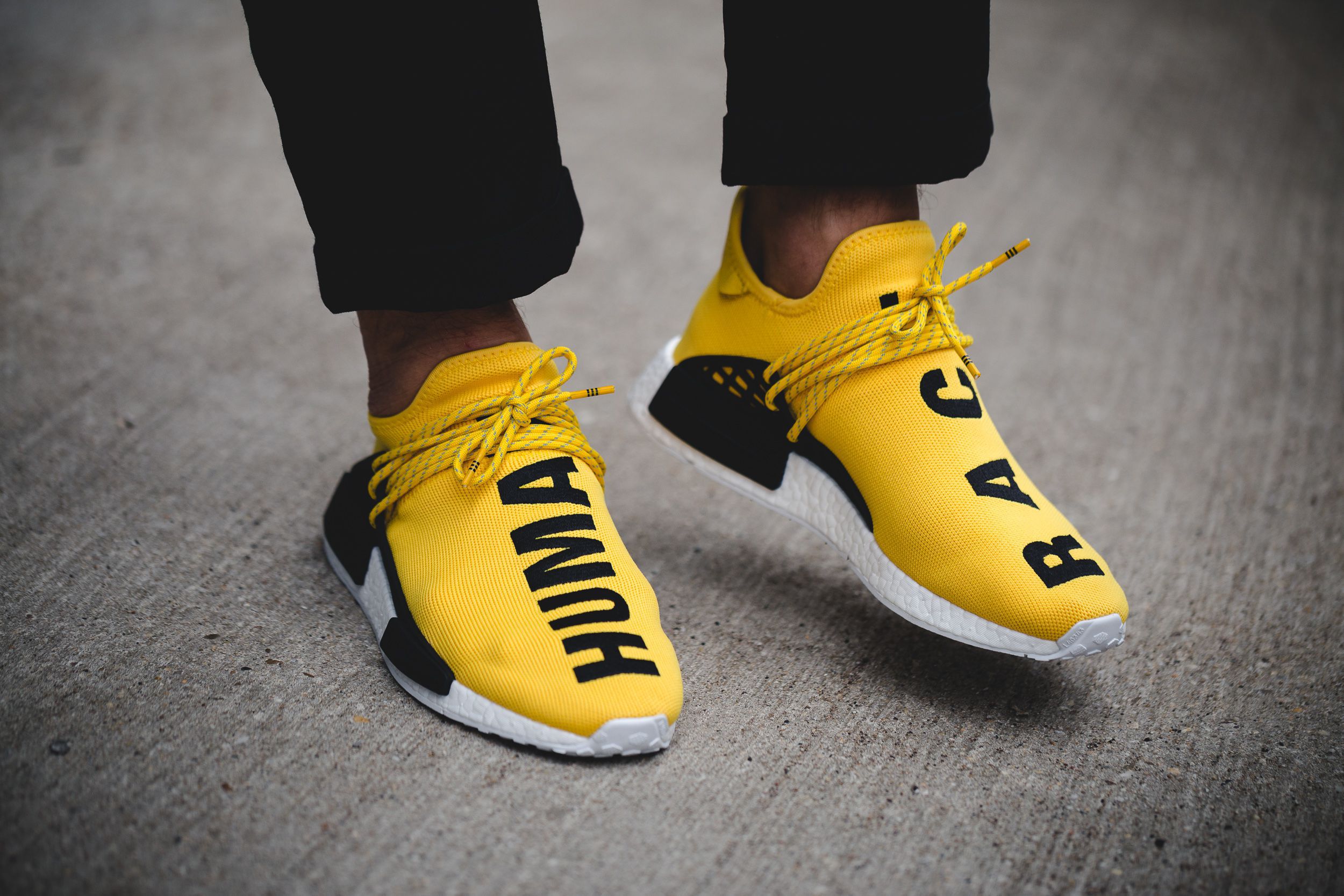 human race sneakers yellow