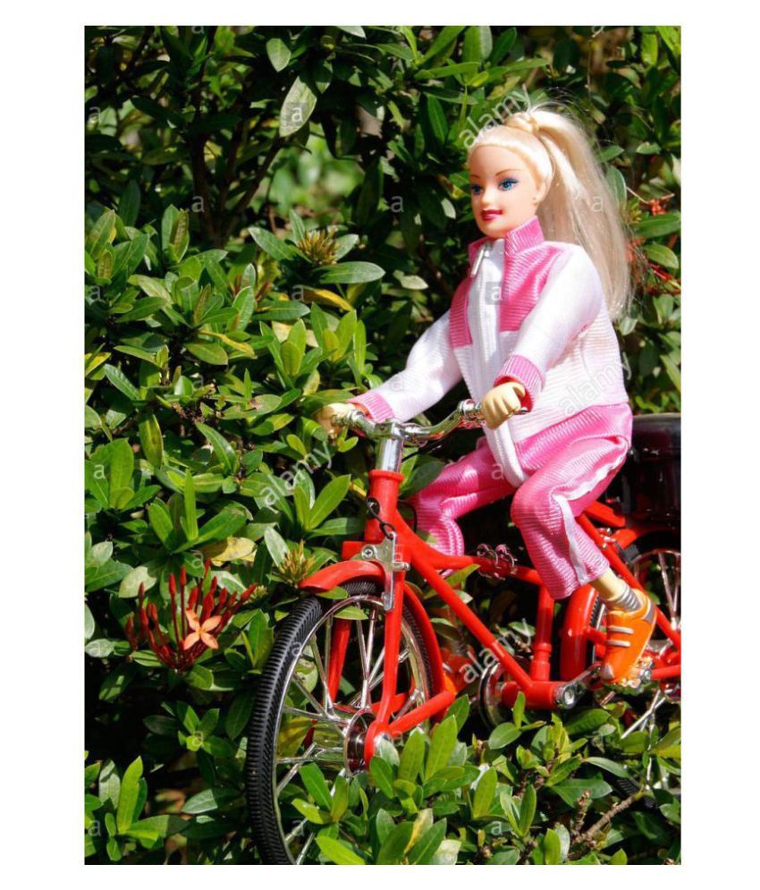 barbie doll with cycle