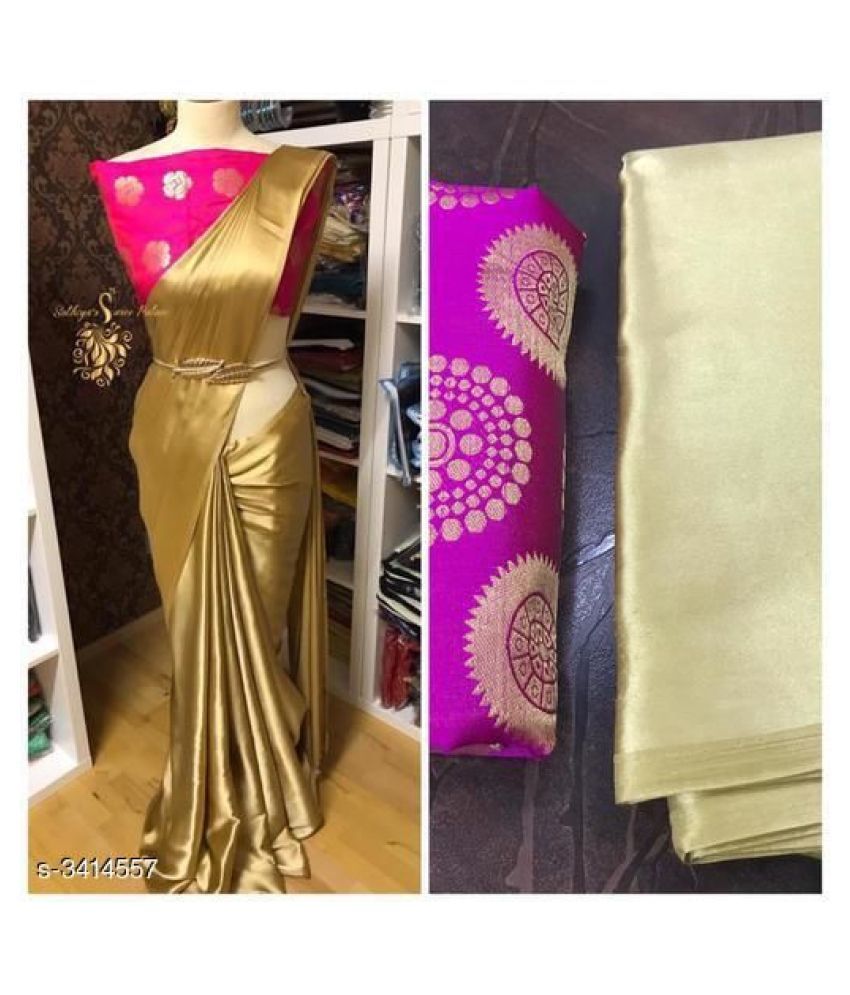 golden saree with pink blouse