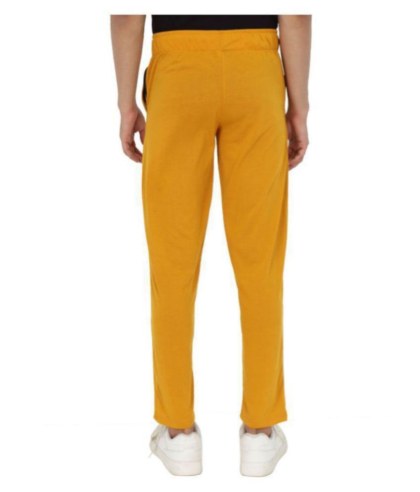 mustard track pants