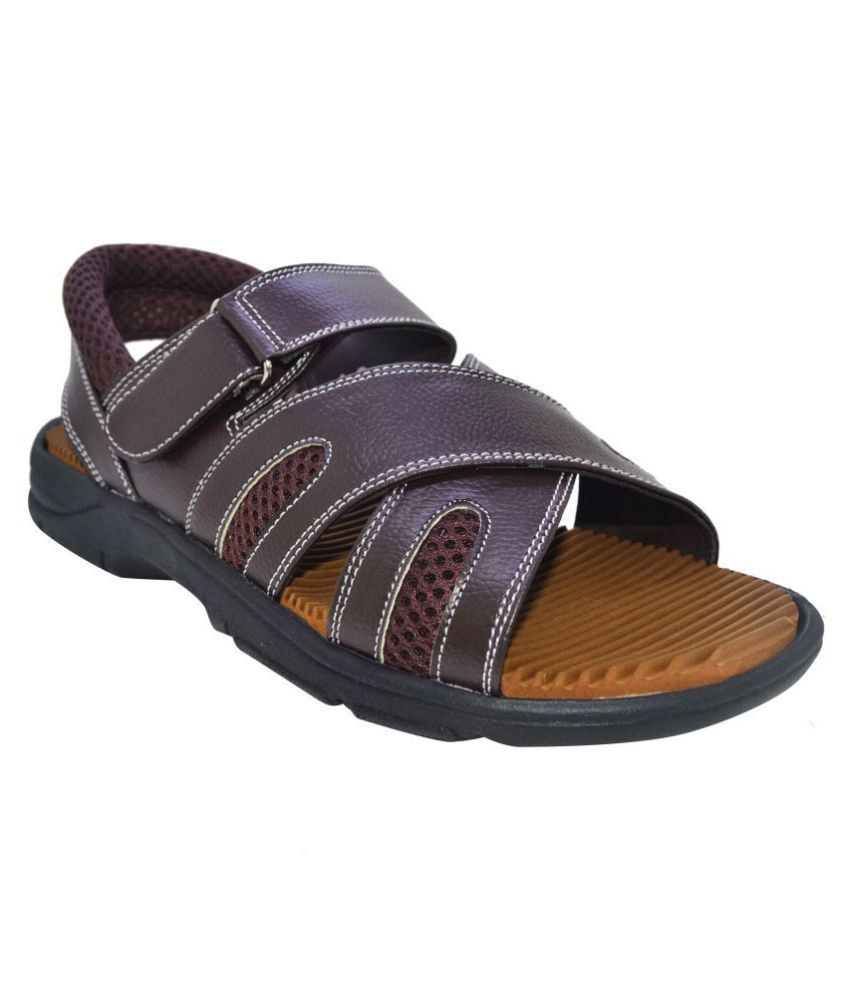     			Ajanta Brown Synthetic Leather Sandals