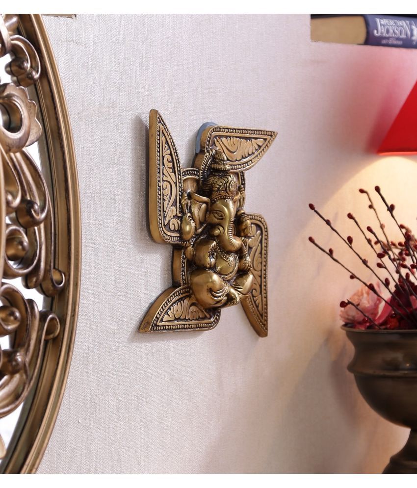     			eCraftIndia Brown Ganesha Swastika Wall Hanging