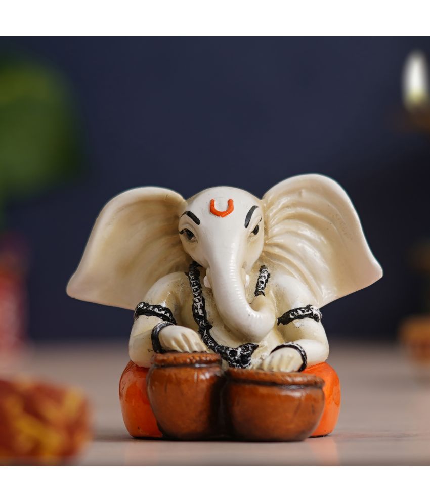     			eCraftIndia White & Orange Lord Ganesha Idol Playing Tabla Showpieces