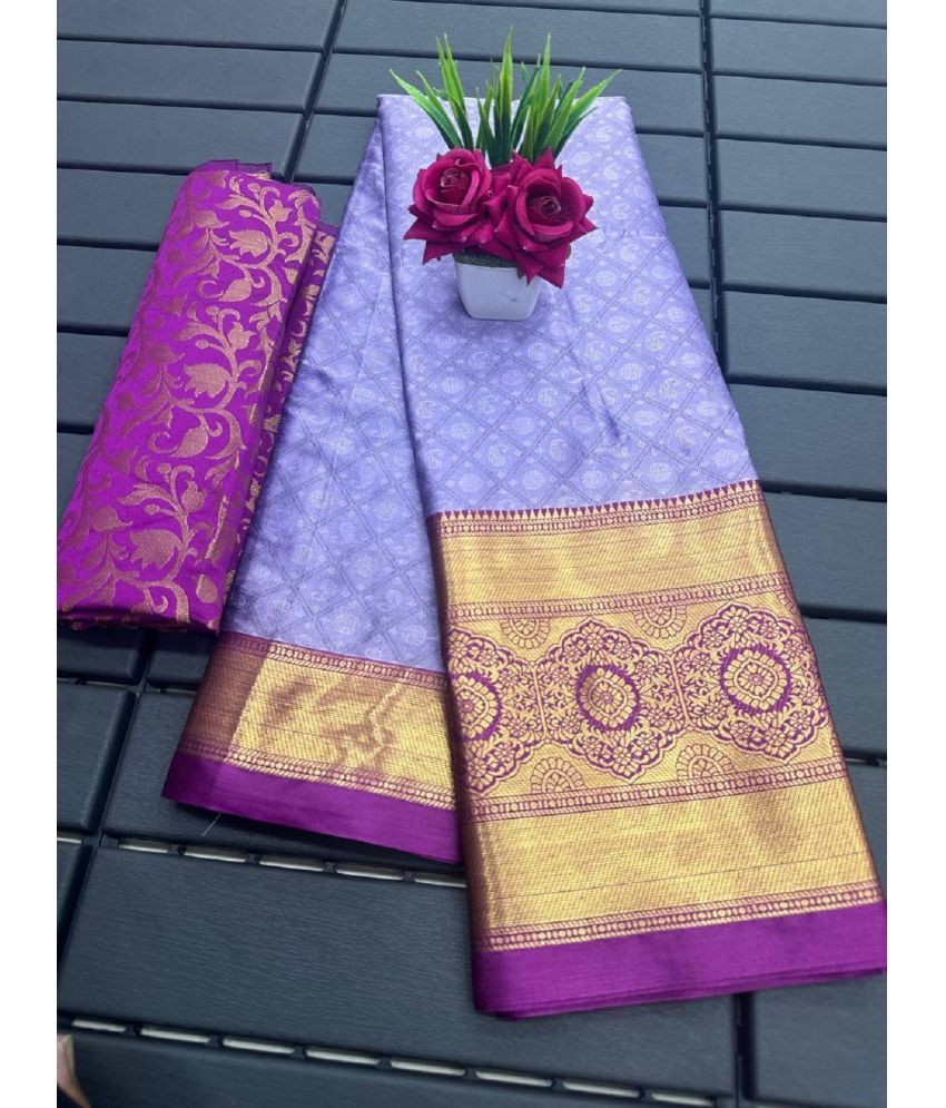     			Apnisha Banarasi Silk Embellished Saree With Blouse Piece - Lavender ( Pack of 1 )