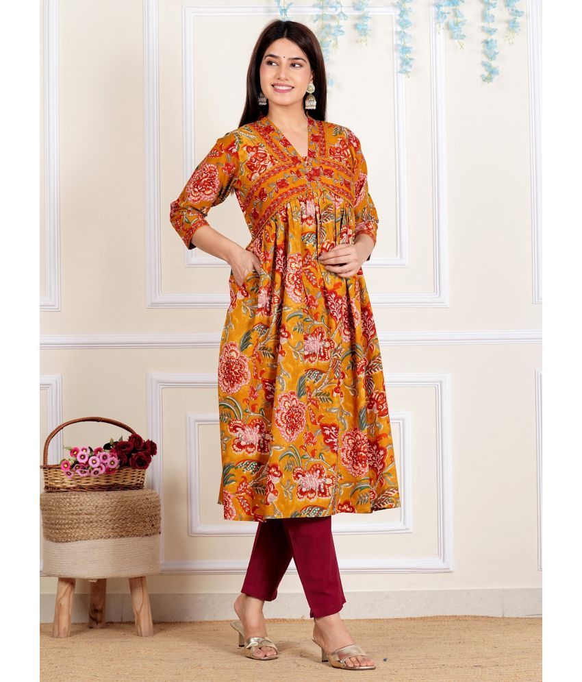     			Vbuyz Cotton Printed Flared Women's Kurti - Mustard ( Pack of 1 )