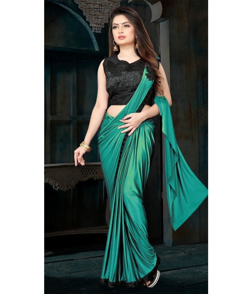     			Shivadit ethnic Lycra Embroidered Saree With Blouse Piece - Teal ( Pack of 1 )